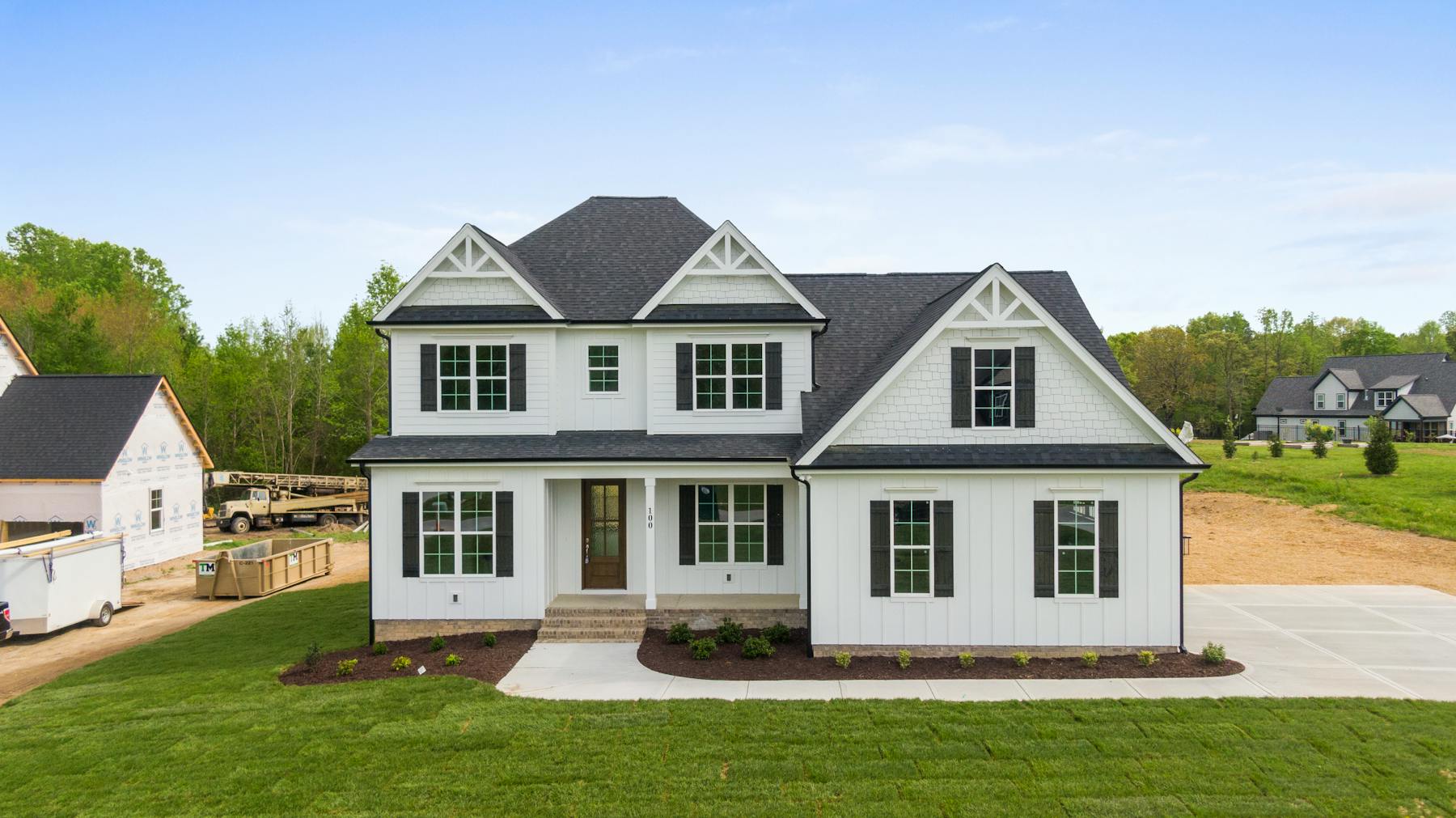 Tidy GTA suburban home with a freshly replaced roof and landscaped lawn